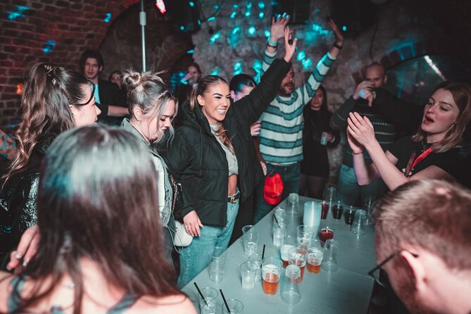 1 Hour of Open Bar Pub Crawl + Karaoke + VIP Entry to Best Clubs - Meeting Point at Church of St. Wojciech, Then You Move With the Group