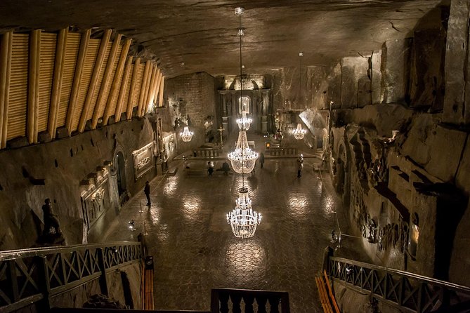 Auschwitz Birkenau and Salt Mine Full Day Guided Tour from Krakow hotel pick up - The guide and headphones setup, and what good pacing feels like