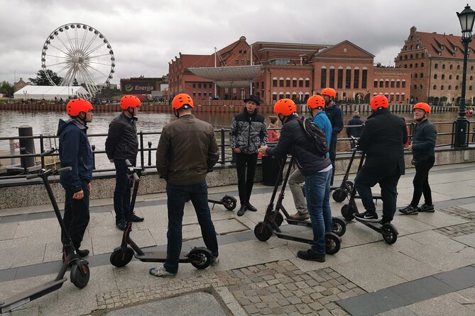 Electric Scooter Tour: Old Town Tour - 2-Hours of Magic! - Weather-proofing: helmet plus raincoat means fewer schedule problems