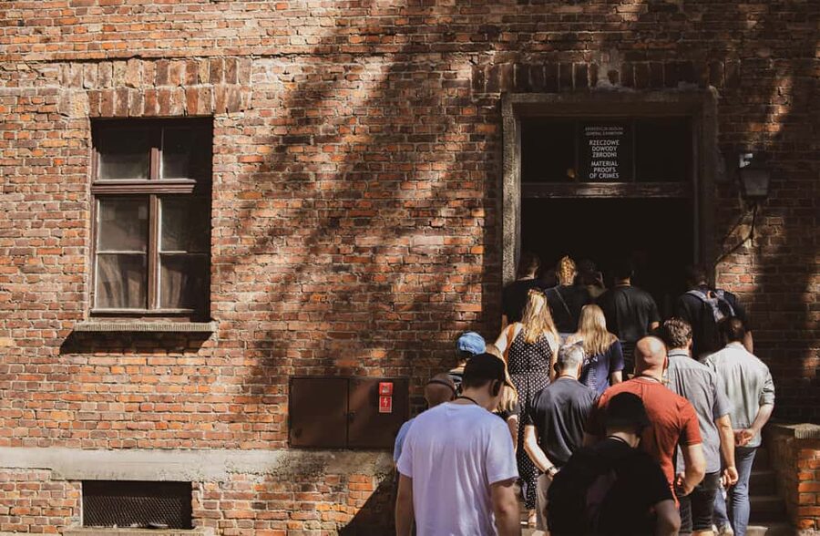 From Krakow: Auschwitz-Birkenau Guided Tour & Pickup - Auschwitz I: Entering Through Arbeit Macht Frei and Getting Context