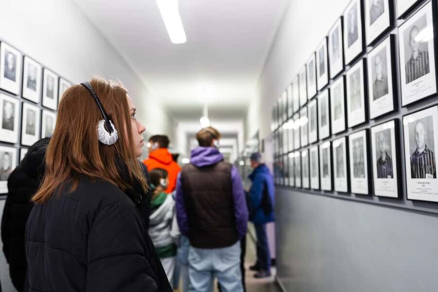 From Krakow: Auschwitz & Birkenau Guided Tour with Pick up - The guides, headsets, and why narration changes the whole visit