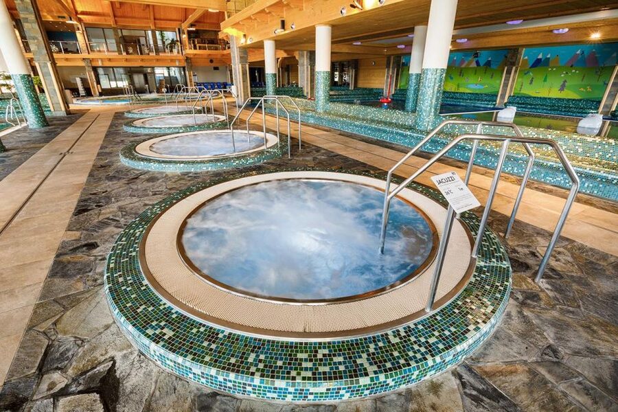 From Krakow: Chochołowskie Thermal Baths Ticket and Transfer - The kid-friendly side: slides, lazy river, and climbing nets