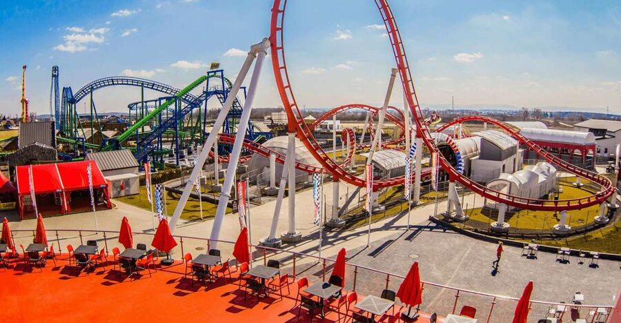From Krakow: Energylandia Amusement Park Ticket & Transport - The park plan that actually works: 7 zones and 133 attractions
