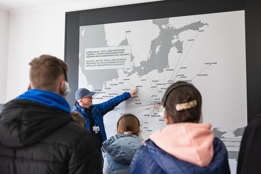 Krakow Auschwitz-Birkenau Memorial Guided Tour Meeting Point - The guide experience: how to hear clearly in a place that demands silence