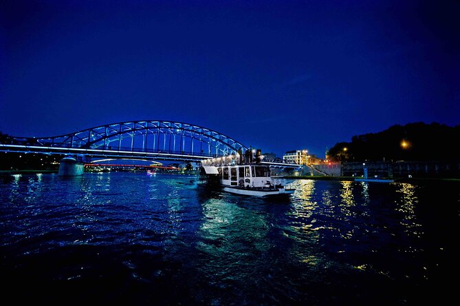 Krakow by night 60 minutes cruise The Vistula River Krakow - The bridge string: Grunwaldzki, Piłsudskiego, and Bernatek at night