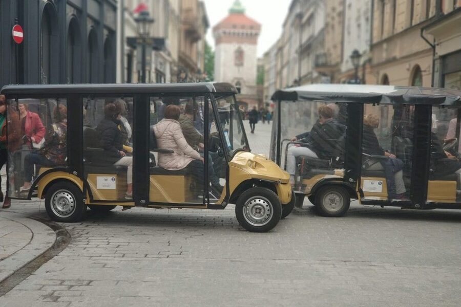 Krakow: City Golf Cart Tour and Schindler's Factory Museum - Main Market Square, Cloth Hall, and St. Mary’s by Planty Park
