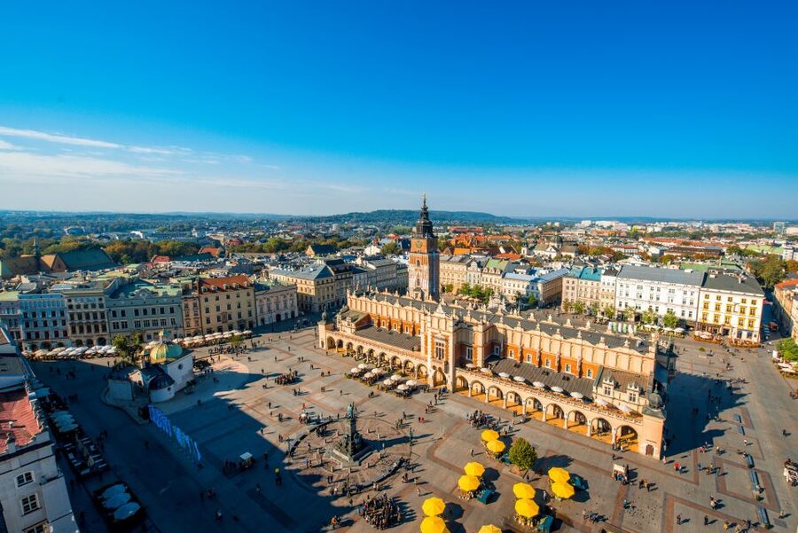 Krakow: City Sightseeing Tour by Electric Golf Cart - Finding the yellow electric buggy at 3 Matejki Square