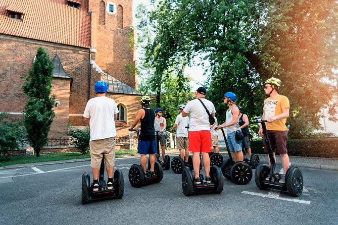 Krakow Old Town Segway Tour 2hr with Training, Safety Gear, Guide - Enter Rynek Glowny: Krakow’s Main Square in Human Scale