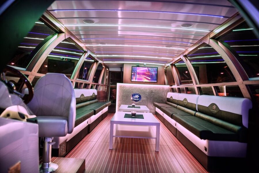 Krakow: Sightseeing Cruise on Vistula River with Audio Guide - A modern catamaran with two decks, a bar, and a warm plan B