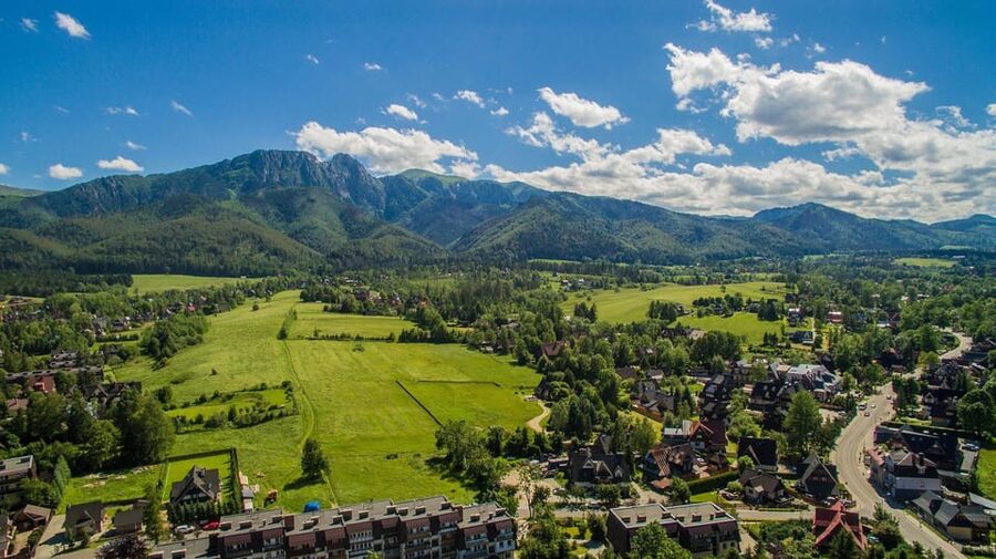 Krakow: Zakopane and Chochołowskie Bath Full Day Trip - The Chochołów village stop, culture in small doses