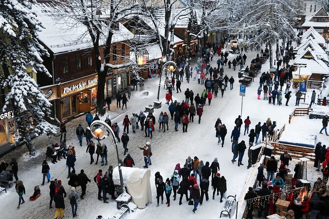 Krakow: Zakopane Tour, Thermal Springs, Cable Car & Hotel Pickup - Chocholow wooden village and Chochołów stops: small time, big photo payoff