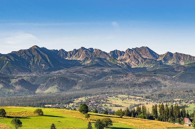 Krakow: Zakopane with Thermal Baths, Cable Car & Hotel Pickup - Zakopane town time: ski-jump views, wooden charm, and quick wins
